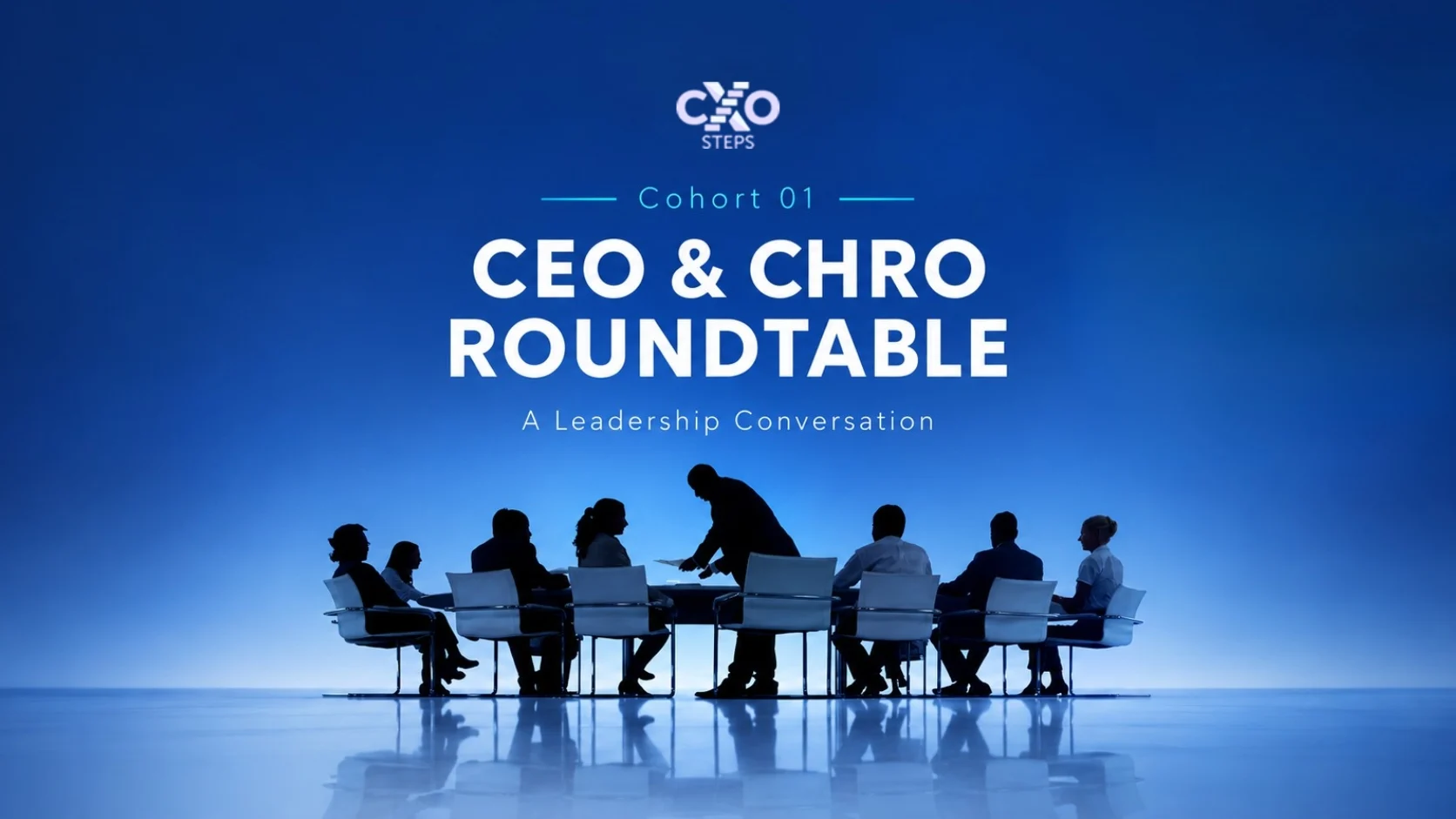Senior leaders in conversation around a table